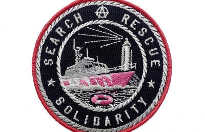 Banksy Designs T-Shirts and Patches for M.V. Louise Michel Rescue Vessel